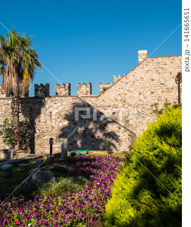 Castle courtyard with garden and ancient walls in Marmaris Turkey Castle courtyard with garden and ancient walls in Marmaris Turkey 141665651