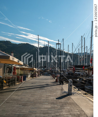 Wooden tourist boats moored at Marmaris embankment in Turkey Wooden tourist boats moored at Marmaris embankment in Turkey 141665667