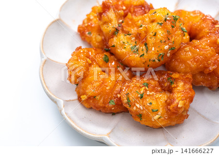 Crispy fried chili shrimp tossed in sweet and spicy sauce, Asian Chinese food style Crispy fried chili shrimp tossed in sweet and spicy sauce, Asian Chinese food style 141666227