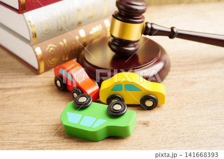 Car accident lawsuit and insurance, Judge hammer with car model. Car accident lawsuit and insurance, Judge hammer with car model. 141668393