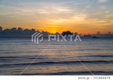 Golden Sunrise Over Keelung Islet in Wanli, Taiwan Golden Sunrise Over Keelung Islet in Wanli, Taiwan 141668879