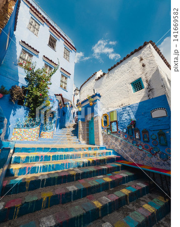 Blue stairway with white village walls Blue stairway with white village walls 141669582