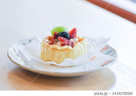 cheesecake with fruit topping or basque cheesecake with fruit topping, piece of cake cheesecake with fruit topping or basque cheesecake with fruit topping, piece of cake 141670080
