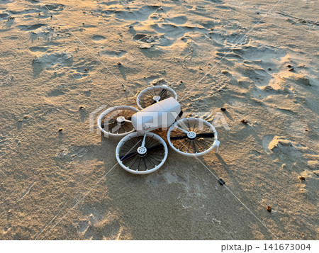 Drone on Sandy Beach Before Sunset Flight Drone on Sandy Beach Before Sunset Flight 141673004