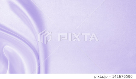 Smooth elegant lilac silk or satin texture as wedding background. Luxurious background design Smooth elegant lilac silk or satin texture as wedding background. Luxurious background design 141676590