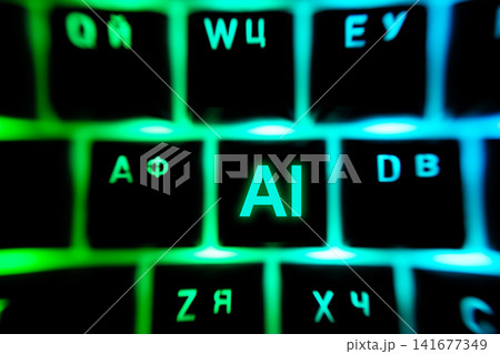 Macro close-up of keyboard keys with glowing AI key illuminated by green RGB lighting, symbolizing artificial intelligence, machine learning, computing and modern technology Macro close-up of keyboard keys with glowing AI key illuminated by green RGB lighting, symbolizing artificial intelligence, machine learning, computing and modern technology 141677349
