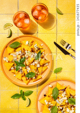 Mango salad with blue cheese and balsamic glaze Mango salad with blue cheese and balsamic glaze 141677435