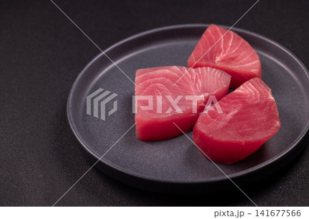Fresh raw tuna fillets for cooking delicious healthy seafood meal Fresh raw tuna fillets for cooking delicious healthy seafood meal 141677566