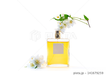 premium perfume packaging with white jasmine blossoms premium perfume packaging with white jasmine blossoms 141679259