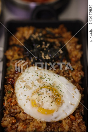 Fried Rice with Egg and Seaweed in Cast Iron Pan Fried Rice with Egg and Seaweed in Cast Iron Pan 141679684