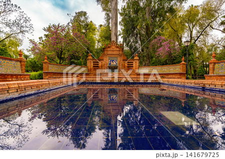 Ornate Tile Fountain and Reflecting Pool in Seville Park Ornate Tile Fountain and Reflecting Pool in Seville Park 141679725