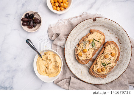 Delicious sandwiches with hummus Delicious sandwiches with hummus 141679738
