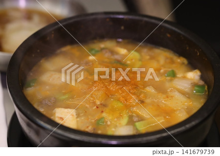 Steaming Hot Pot Soup with Tofu and Vegetables Steaming Hot Pot Soup with Tofu and Vegetables 141679739