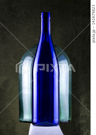 Still life with glassware on a dark background Still life with glassware on a dark background 141679823