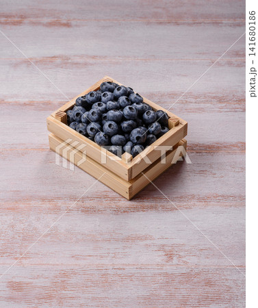 Fresh, ripe, and juicy wild blueberries as an ingredient for vegetarian dishes Fresh, ripe, and juicy wild blueberries as an ingredient for vegetarian dishes 141680186