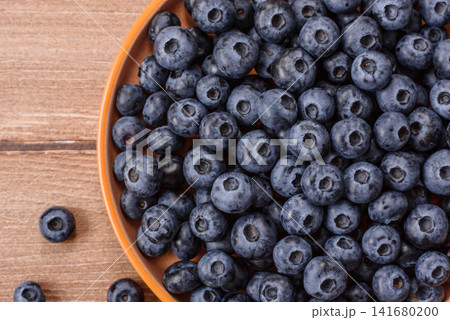 Fresh, ripe, and juicy wild blueberries as an ingredient for vegetarian dishes Fresh, ripe, and juicy wild blueberries as an ingredient for vegetarian dishes 141680200