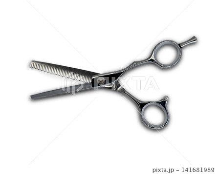 Thinning scissors isolated on white background Thinning scissors isolated on white background 141681989