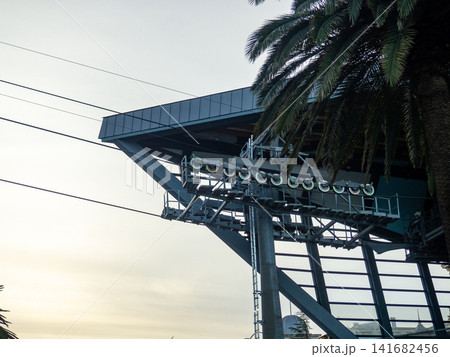 Lift to the mountain. Cable car mechanism. Cable car cabin. 141682456