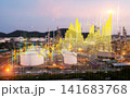 Rising stock market graph overlay on oil refinery plant at sunset, concept of oil price surge, energy sector investment and economic growth. 141683768