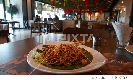 Delicious Noodle Dish Served on Banana Leaf at Restaurant Delicious Noodle Dish Served on Banana Leaf at Restaurant 141684589