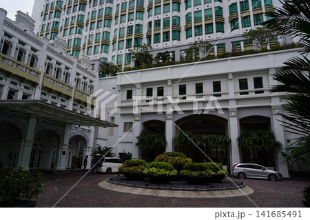 Luxury Hotel Entrance Blending Colonial and Modern Styles Luxury Hotel Entrance Blending Colonial and Modern Styles 141685491