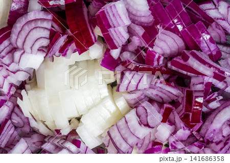 Closeup chopped red and white onion layers culinary texture background 141686358