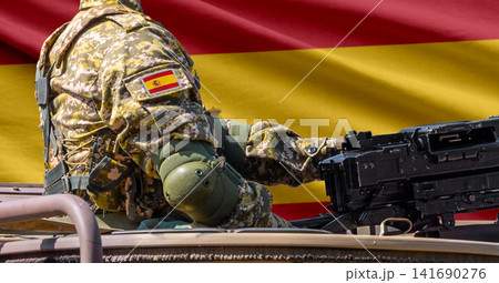 Spain flag with soldier at machinegun turret 141690276