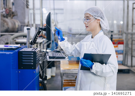 Hygiene inspector stuff officer work in science factory. Pharmaceutical medicine production process. Hygiene inspector stuff officer work in science factory. Pharmaceutical medicine production process. 141691271