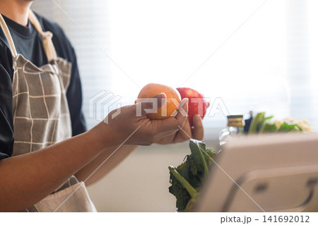 Middle Aged Asian Man Choosing Fresh Fruit for Healthy Aging Middle Aged Asian Man Choosing Fresh Fruit for Healthy Aging 141692012