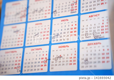 Calendar showing months of the year with marked dates and events Calendar showing months of the year with marked dates and events 141693042