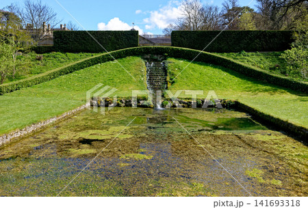 The stepped stone water cascade and formal garden terrace pool at Dyrham Park, England 141693318