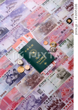 Taiwan, Taiwanese passport or id document with tickets for flight, travel. Taiwanese passport Taiwan, Taiwanese passport or id document with tickets for flight, travel. Taiwanese passport 141695106