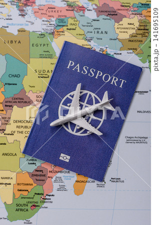 International passport against a map backdrop, concepts of travel. Passport on a map International passport against a map backdrop, concepts of travel. Passport on a map 141695109