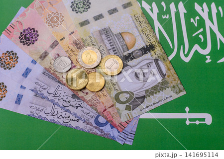 Saudi Arabia paper money, riyal banknotes and coins as currency for exchange. Saudi Arabia money 141695114