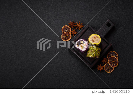 Turkish delight or lokum is a traditional Eastern sweet made with nuts. Turkish delight, lokum Turkish delight or lokum is a traditional Eastern sweet made with nuts. Turkish delight, lokum 141695130