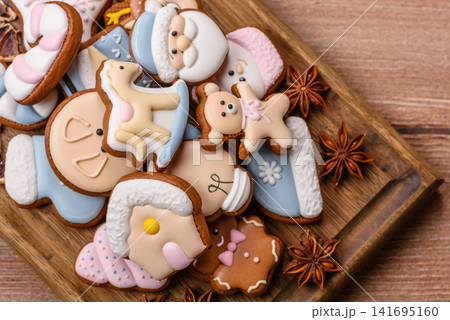 Gingerbread as a Christmas staple, sweet biscuits for the holiday. Gingerbread as a background 141695160