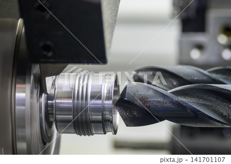 Hole drilling process on precision part using multitasking CNC Swiss type lathe. 141701107