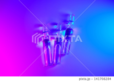 Ampoules representing medical innovation and science treatment Ampoules representing medical innovation and science treatment 141708284