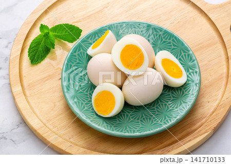 fresh Peeled Hard Boiled Eggs With Whole And Halved Yolks fresh Peeled Hard Boiled Eggs With Whole And Halved Yolks 141710133