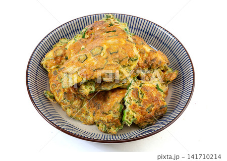 pan Fried Egg Omelet Mixed With Sliced Fresh Green Okra pan Fried Egg Omelet Mixed With Sliced Fresh Green Okra 141710214
