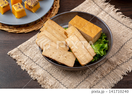 solid Blocks Of Firm Seasoned Pressed Tofu Rich In Plant Protein solid Blocks Of Firm Seasoned Pressed Tofu Rich In Plant Protein 141710240