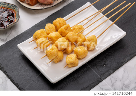 deep Fried Tofu Puffs On Skewers For Street Food Hot Pot deep Fried Tofu Puffs On Skewers For Street Food Hot Pot 141710244