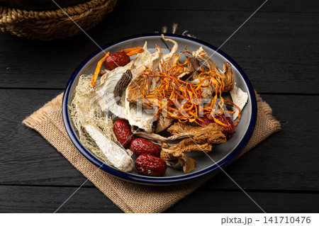 mixed Dried Mushrooms And Chinese Herbs For Soup Base mixed Dried Mushrooms And Chinese Herbs For Soup Base 141710476