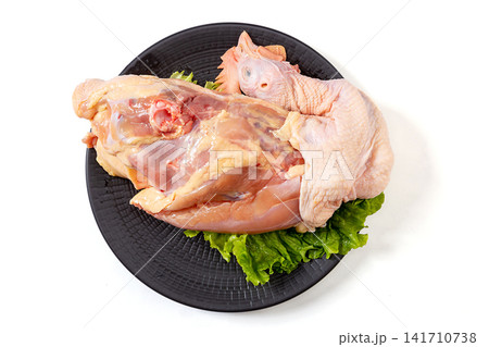 fresh raw chicken carcass and bones for broth preparation fresh raw chicken carcass and bones for broth preparation 141710738