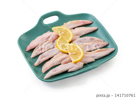 fresh raw chicken wingtips for making rich broth and stock 141710761
