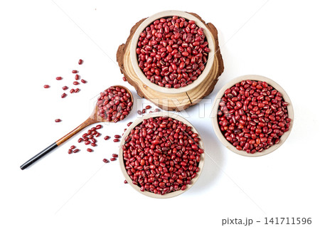 raw organic red adzuki beans filled in ceramic bowls 141711596