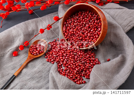 raw organic red adzuki beans filled in ceramic bowls raw organic red adzuki beans filled in ceramic bowls 141711597