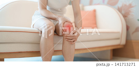 woman having knee ache and muscle pain due to Runners Knee or Patellofemoral Pain Syndrome, osteoarthritis, arthritis, rheumatism and Patellar Tendinitis. health and medical concept woman having knee ache and muscle pain due to Runners Knee or Patellofemoral Pain Syndrome, osteoarthritis, arthritis, rheumatism and Patellar Tendinitis. health and medical concept 141713271