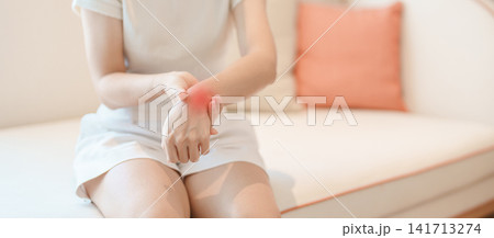Woman having wrist pain for Carpal Tunnel Syndrome, Wrist Tendinitis, muscle ache, De Quervain s tenosynovitis, ergonomic, Hand Osteoarthritis, Office syndrome and Parkinson disease concept Woman having wrist pain for Carpal Tunnel Syndrome, Wrist Tendinitis, muscle ache, De Quervain s tenosynovitis, ergonomic, Hand Osteoarthritis, Office syndrome and Parkinson disease concept 141713274