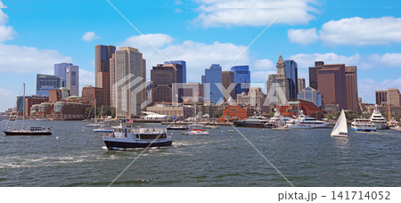 Boston skyline with passengers boats sailing on the foreground, USA Boston skyline with passengers boats sailing on the foreground, USA 141714052